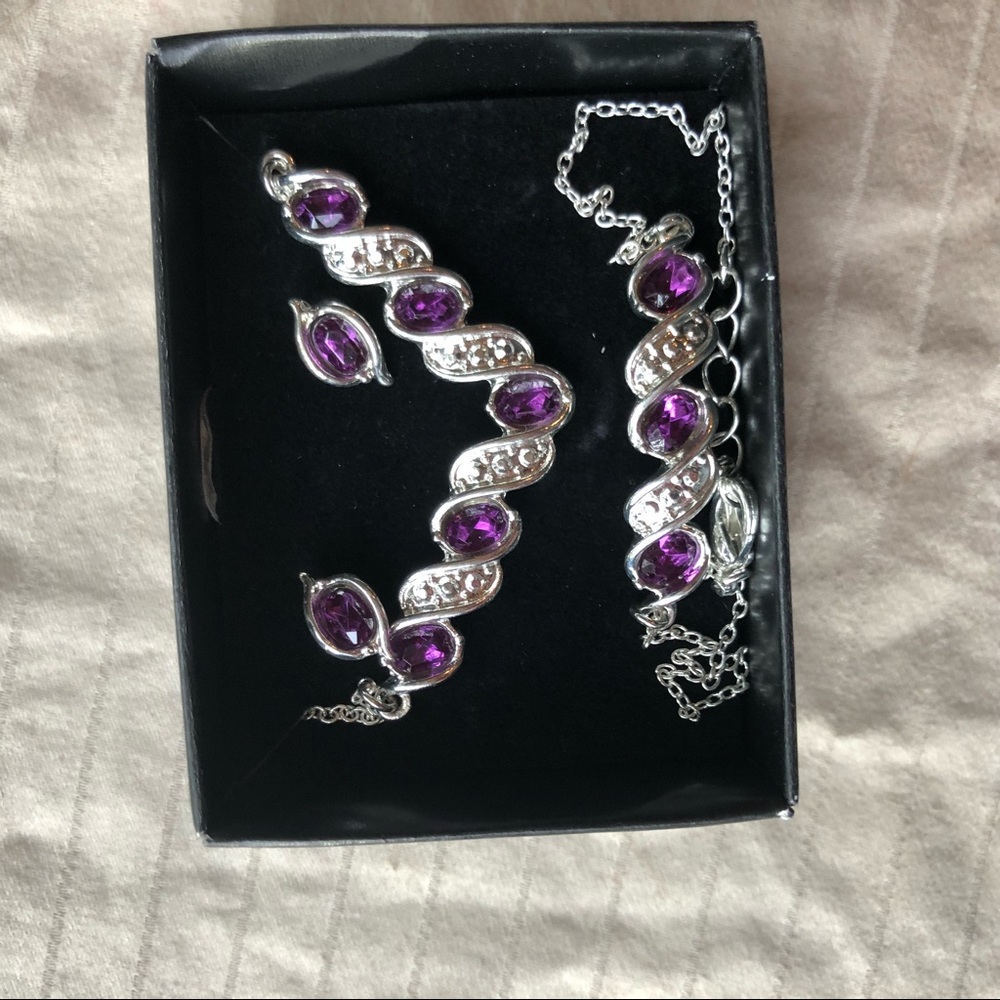 Silver jewelry set with purple stones